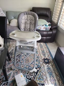 Ingenuity Almost new baby  high chair  price for quick sale