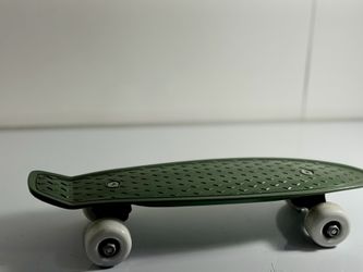 Small Dark Green Plastic Cruiser Skateboard