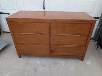 Solid wood dresser. Can deliver