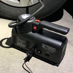 New In Box Mini Air Compressor Tire Inflator AC Or DC Powered 