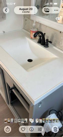 Sink top with faucet