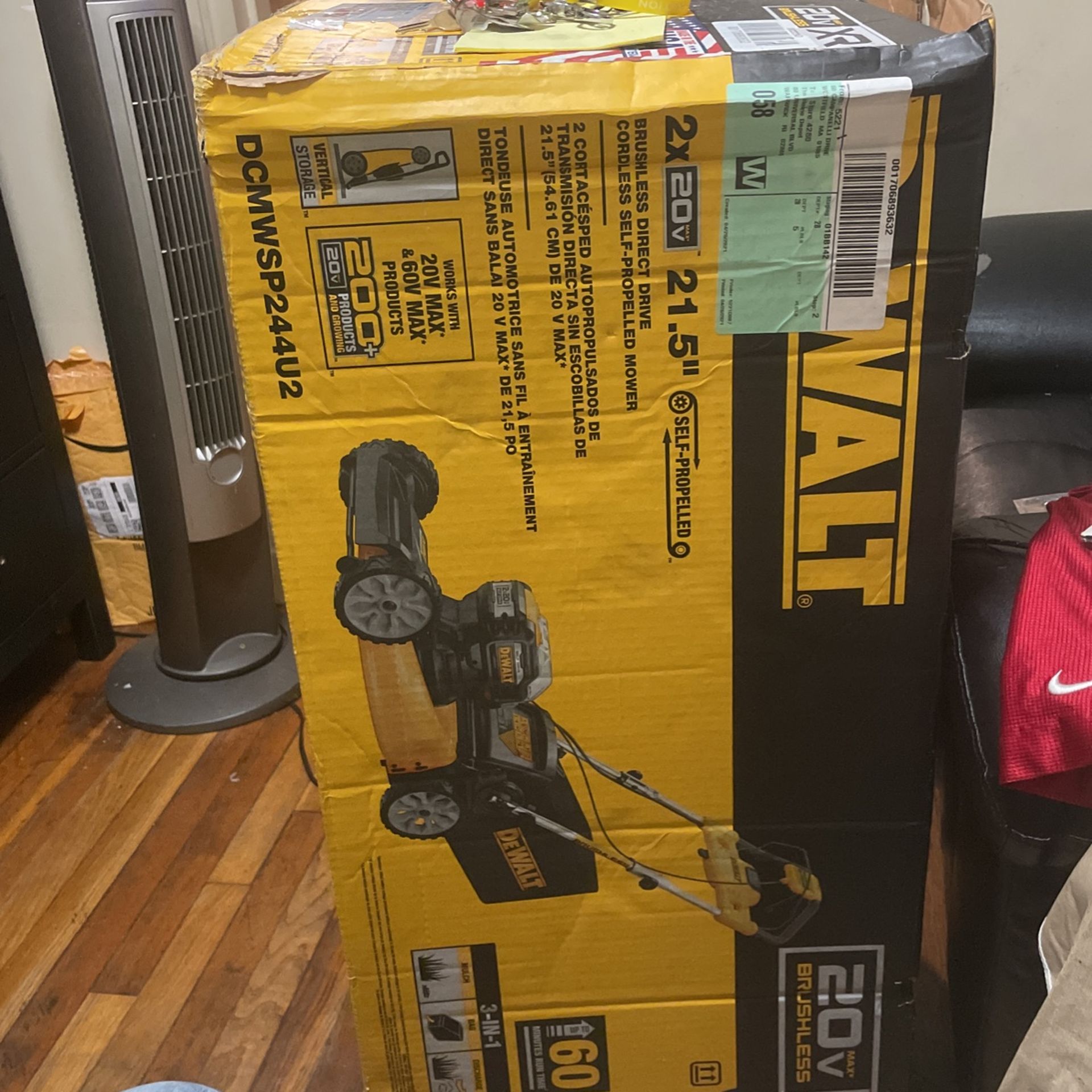 A Dewalt 20 V brushless lawnmower brand new in the box self-propelled battery powered￼