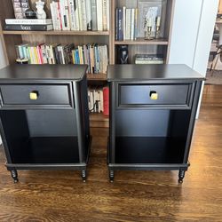 Set of two black wood nightstands