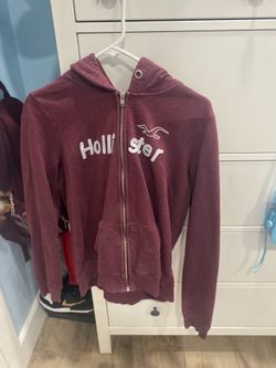 Hollister purple zip up jacket with the name Los Angeles on the hood