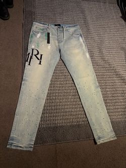 Amiri Light Wash Distressed Denim Jeans