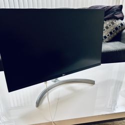 LG 27” monitor with white cables 