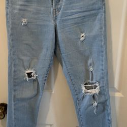 Levi's Womens Size 27  Distressed Raw Hem Wedgie Skinny Button Jeans