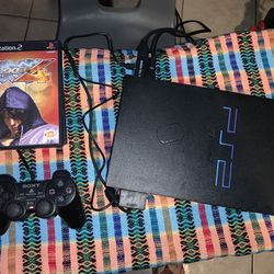 PLAYSTATION 2 SYSTEM WITH GAMES 
