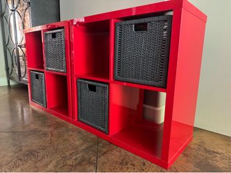 2 Fun red IKEA cube shelves + 4 gray wicker baskets