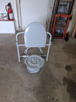 Bedside commode brand new