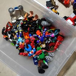 Container Of Toy Figures