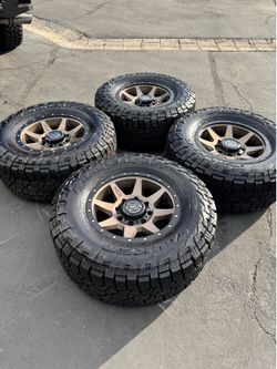 New 8x180 GMC Sierra Chevy Silverado 2500 18” Icon Wheels and 35” Falken WildPeak AT4W Tires 8 Lug