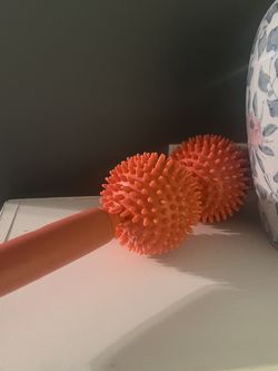 Back roller and vase 