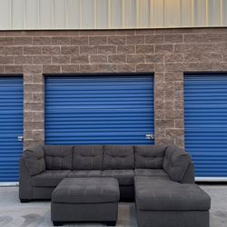 Ashley’s furniture grey sectional sofa couch with ottoman