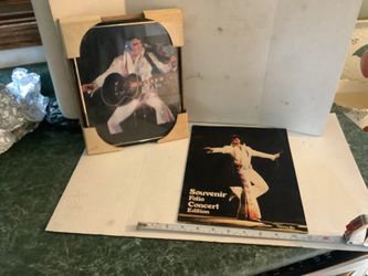 Elvis Presley Souvenir Folio concert edition volume six, excellent condition from 1976, has we-24 color pages of Elvis moments and an 8x10 framed pict