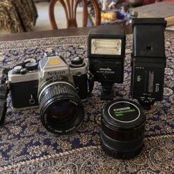 Nikon 35mm Film Camera with Lenses and Flashes