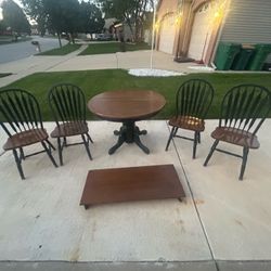 Round wooden cherry finished top dining table with hunter green pedestal base extra leaf & 4 chairs
