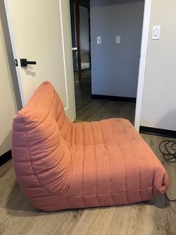Modern armless sofa (pink/peachy color)