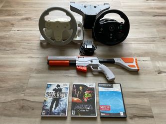 Wii haul (2 Logitech wheels 3 games 1 lightgun)