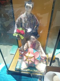 Vintage Japanese male and female in kimono and glass frame.