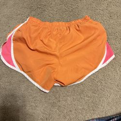 Orange running shorts