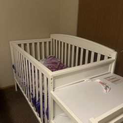 Organizing tables, microwave, and baby bed