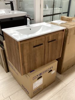 30” floating vanity, ceramic top, available for pick up