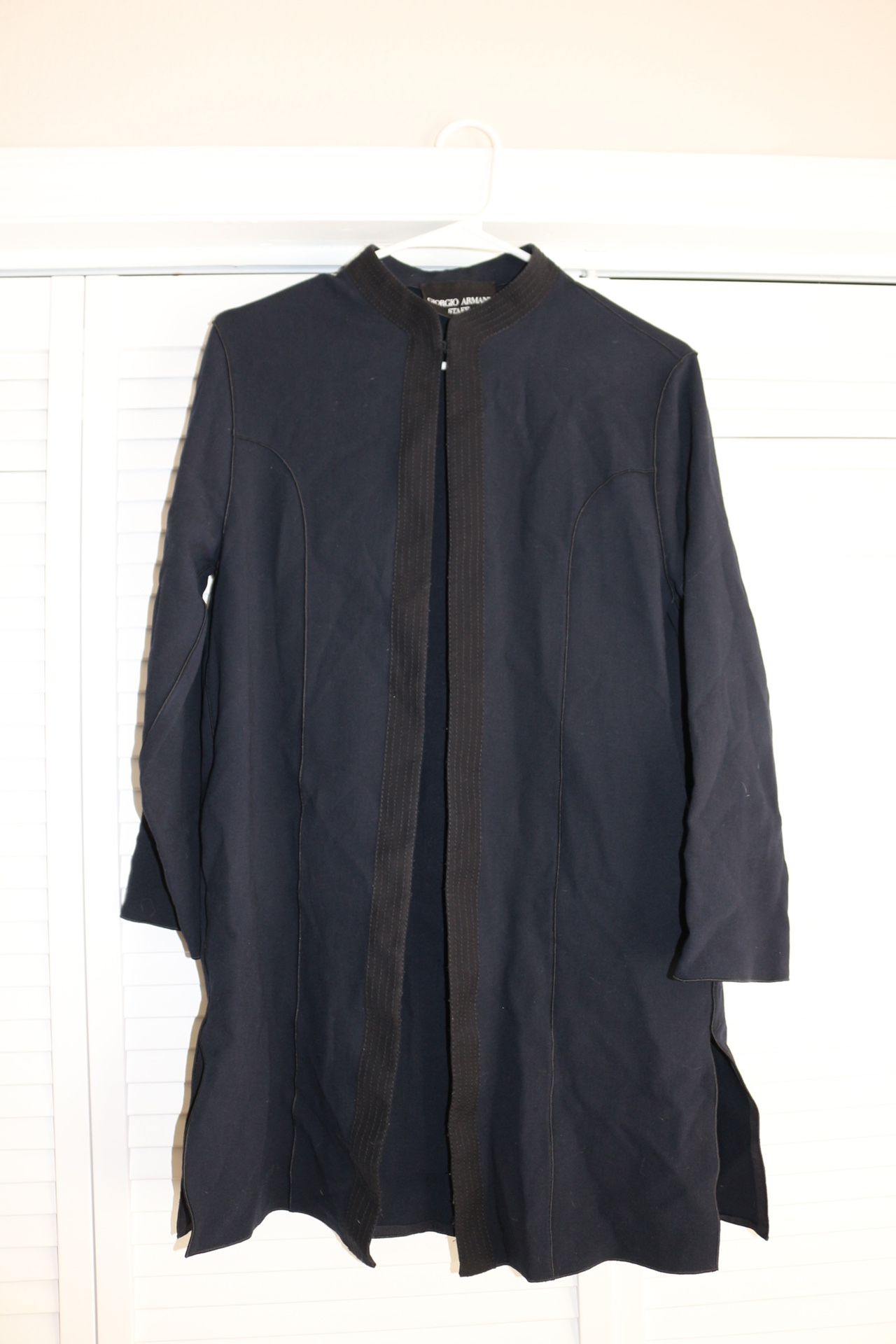 Armani coat. Small hole….fixable if you know how to sew.