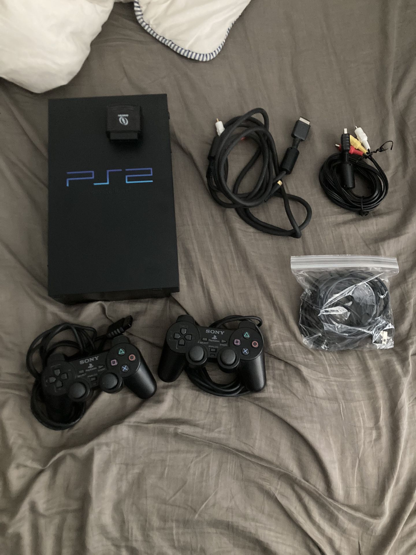 PLAYSTATION/PS2 CONSOLE, CONTROLLERS, CORDS, AND MEMORY CARD
