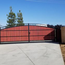 Custom steel gates with integrated rustic wooden planks