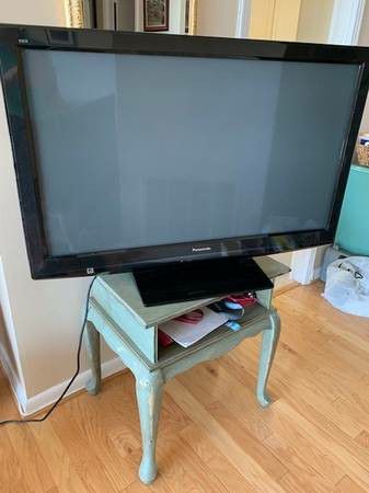 Black Panasonic 42 inch TV with remote control and 3 HDMI ports