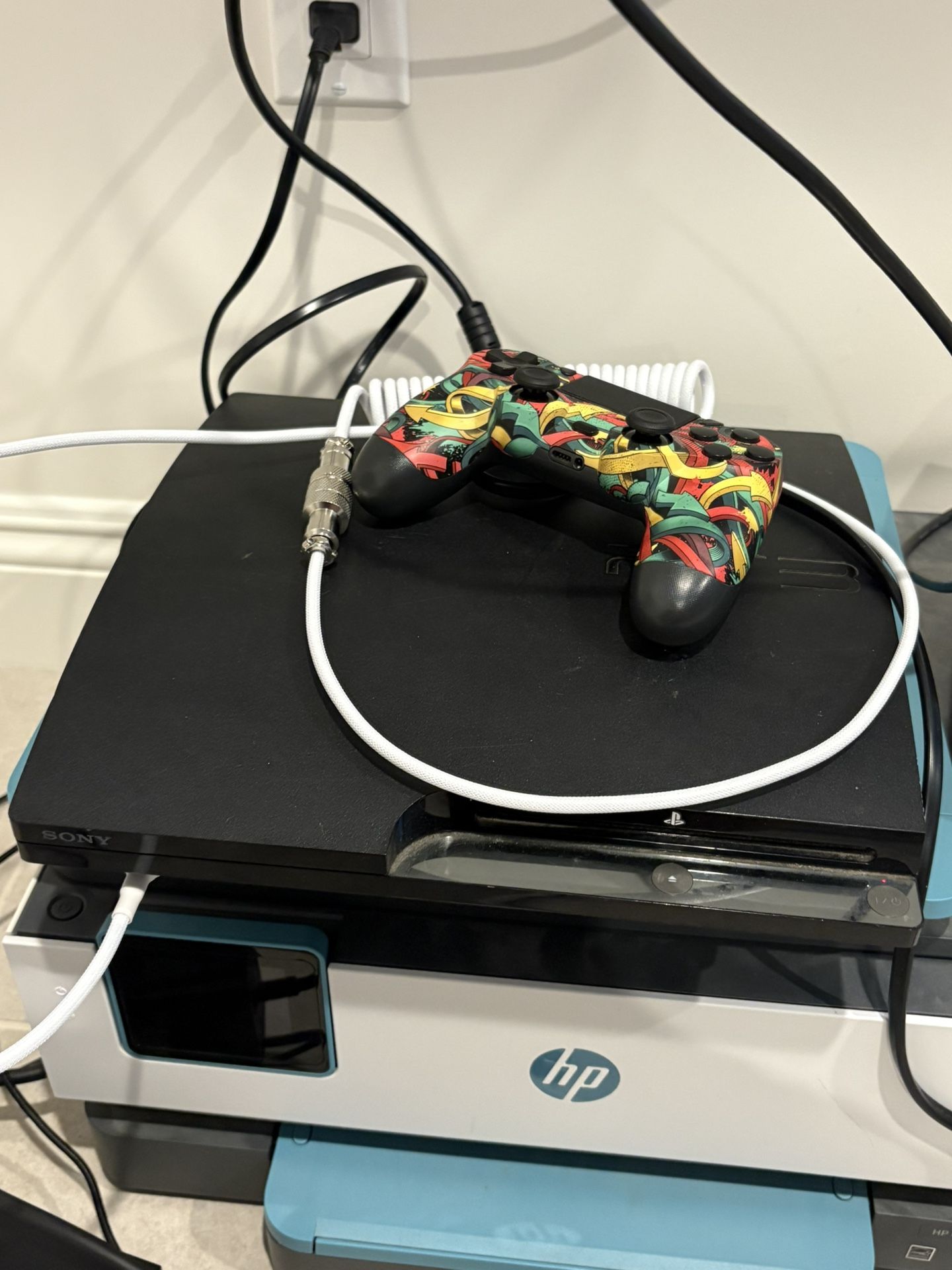 PS4 Slim 150GB + 4 Games (controllers and cables Included)