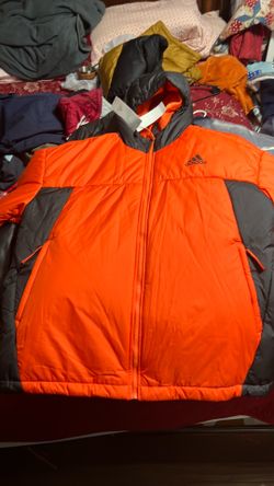 Orange and black adidas puffer jacket