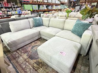 Grey Fabric Sectional couch with ottoman from Costco