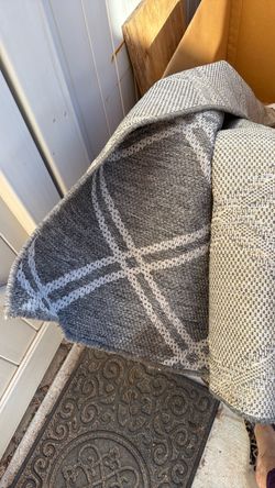 Outdoor area rugs, two of them approximately 5 x 7 must pick up in Bonsall