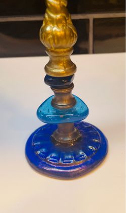 Beautiful and unique piece of glass and brass art ring holder