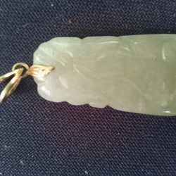 Jade Pendant With Gold Clasp