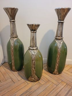 Antique flower vase.  The big ones are about 30 inches  and the small one is about 22 inches