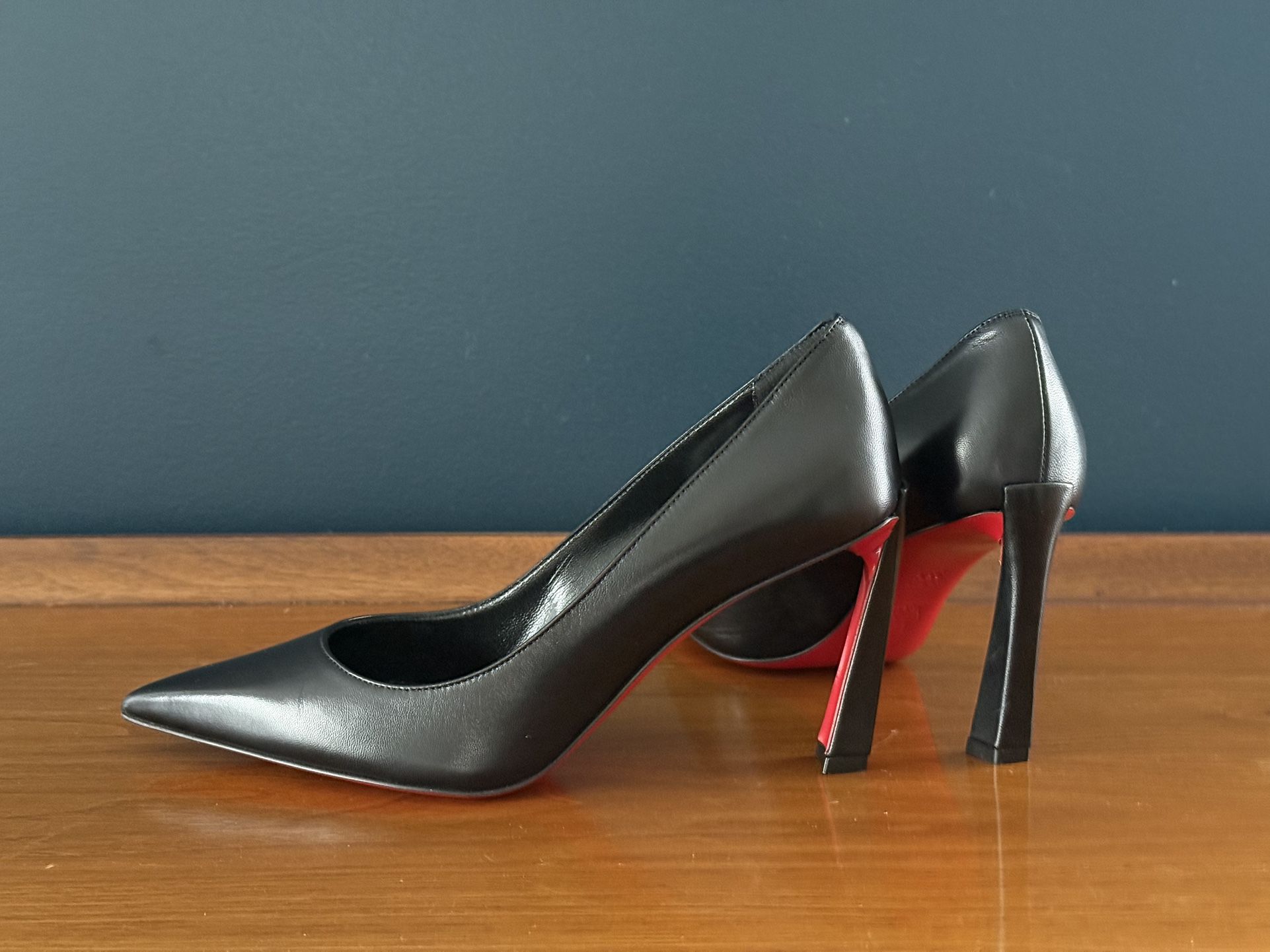 Louboutin Black Leather Pumps