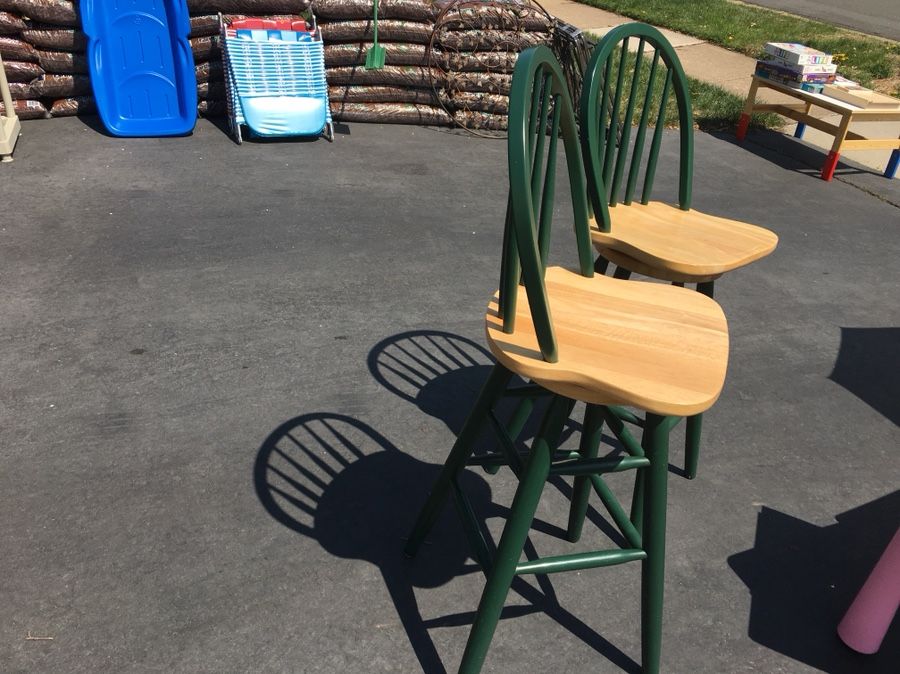 Price for sale: Two real wood swiveling bar stools $25
