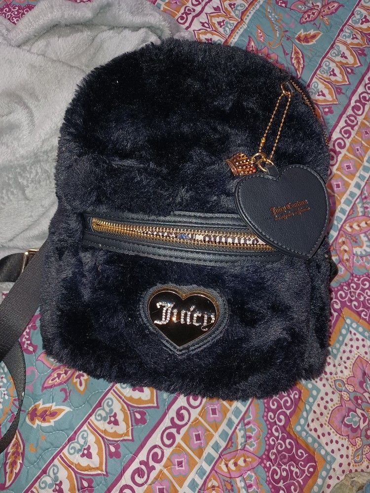 Juicy Cutoure Purse Backpack .