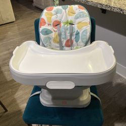 fisherprice high chair with tray straps onto chair