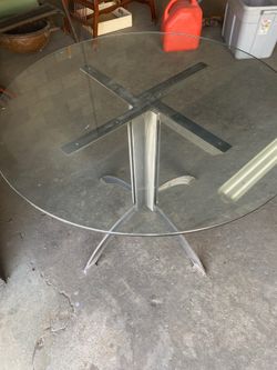 Custom built glass top iron table