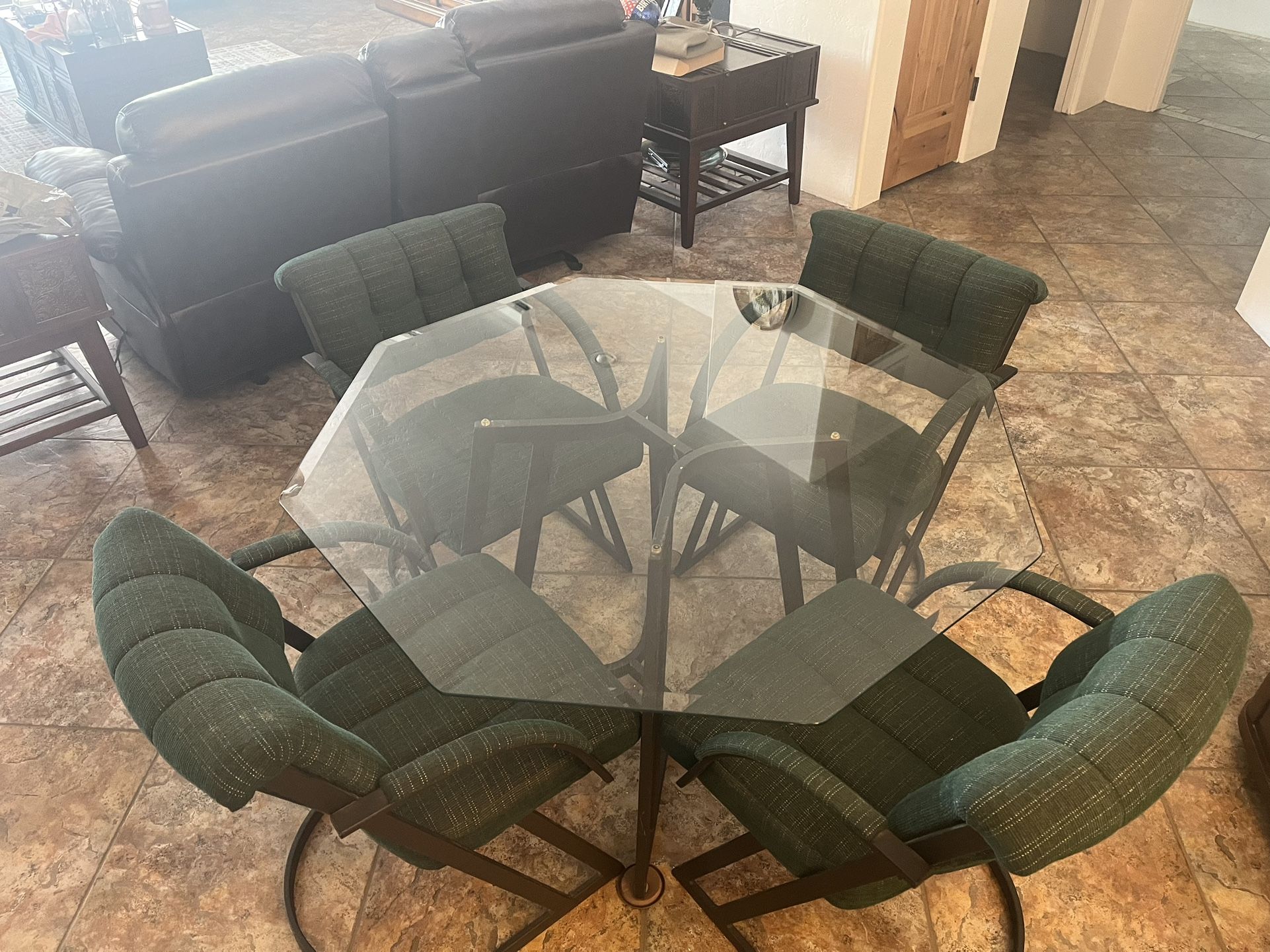 Glass Table With Green Chairs 