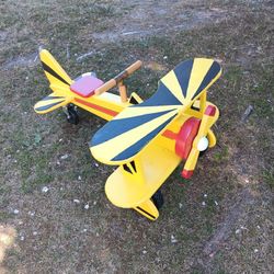 Kids solid wooden air plane on wheels works great 