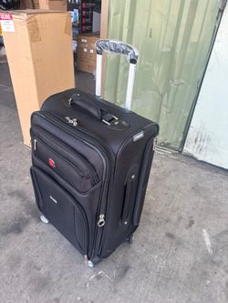20-inch SwissGear Wenger Identity Spinner cabin suitcase.