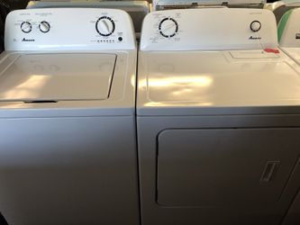 Used Amana High Efficiency washer and dryer set. 1 year warranty
