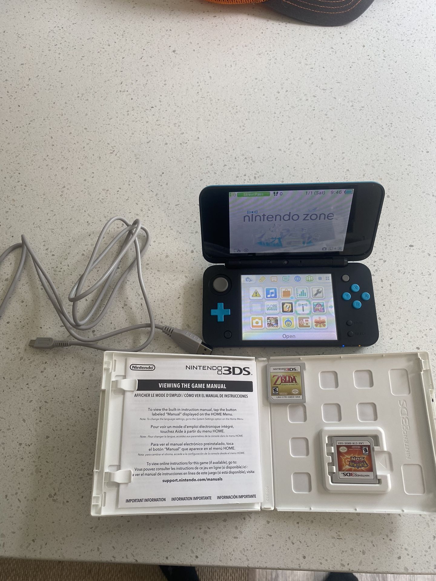 Model  ( new Nintendo DS XL ) Nwith 2 games Zelda / Pokémon Sun  Pick up in orting