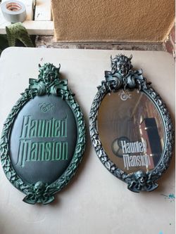 Two hunted masion plaque