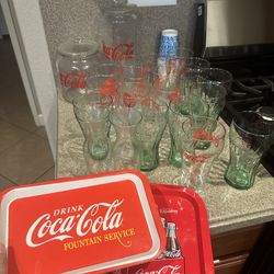 Coca-Cola glass cups and trays